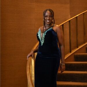 A blue evening gown perfect for prom or pageants